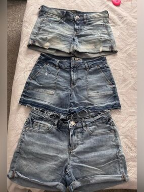 Three pairs of Blue Denim Shorts - size 4